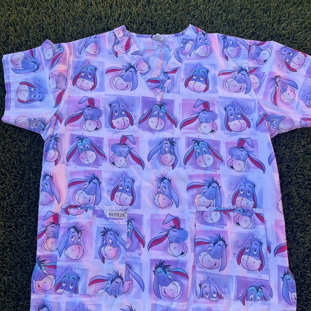 Disney Women's Eeyore Print Scrub Top - Purple and Pink